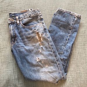 Distressed boyfriend fit denim & supply jeans